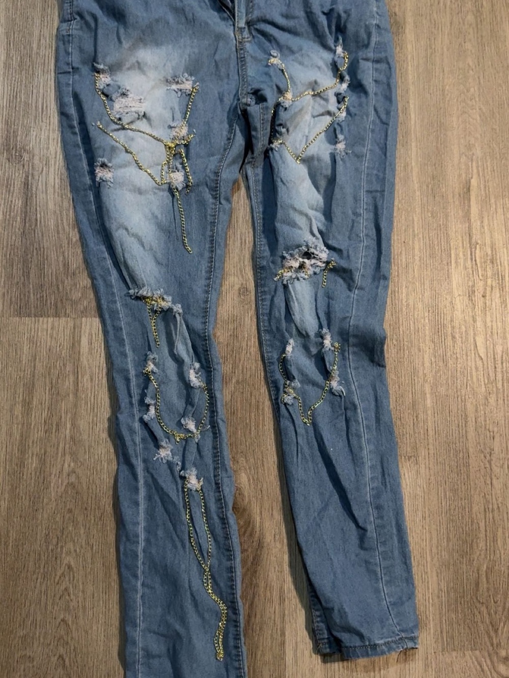 Distressed Light Blue Women's Jeans with Chain Detail